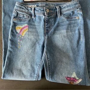 Girls size 8 regular Jeggings with decals. Good condition.